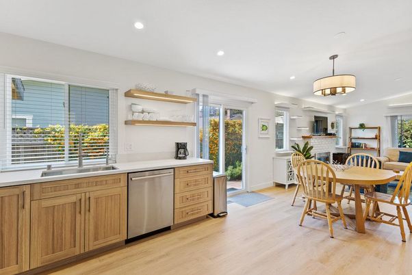 Dining room, Fireplace, Interior, Kitchen, Recessed Lighting, Stainless Steel Appliances, Wood Texture Flooring