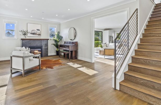 Fireplace, Interior, Living room, Piano, Recessed Lighting, Wood Texture Flooring