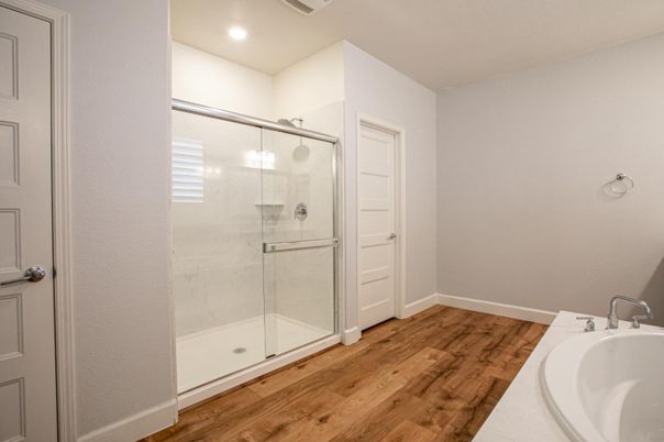 Bathroom, Glass Shower, Interior, Recessed Lighting, Wood Texture Flooring