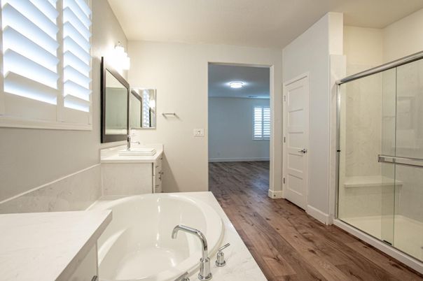Bathroom, Dual Sink Vanities, Glass Shower, Interior, Wood Texture Flooring
