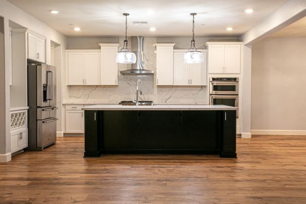 Interior, Kitchen, Marble Walls, Pendant Lights, Recessed Lighting, Stainless Steel Appliances, Wood Texture Flooring