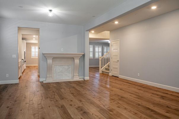 Empty room, Fireplace, Interior, Recessed Lighting, Wood Texture Flooring