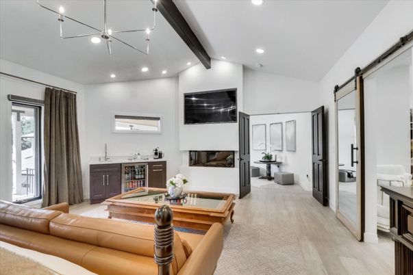 Billiard Table, Fireplace, Game Room, Interior, Living room, Pendant Lights, Recessed Lighting, Wood Texture Flooring