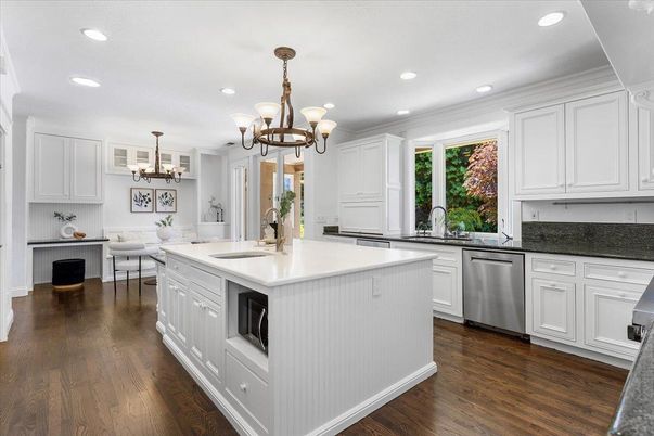 Chandelier, Dining room, Interior, Kitchen, Recessed Lighting, Stainless Steel Appliances, Wood Texture Flooring