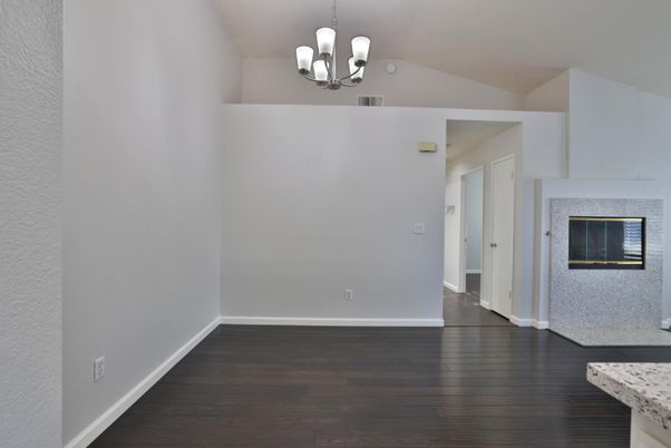Chandelier, Empty room, Fireplace, Interior, Wood Texture Flooring