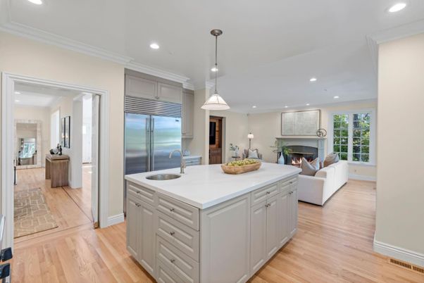 Fireplace, Interior, Kitchen, Living room, Pendant Lights, Recessed Lighting, Stainless Steel Appliances, Wood Texture Flooring
