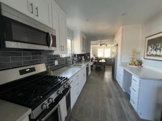 Dining room, Interior, Kitchen, Recessed Lighting, Stainless Steel Appliances, Wood Texture Flooring