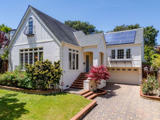 Attached, Exterior, Facade, Solar Panels, Tudor Revival