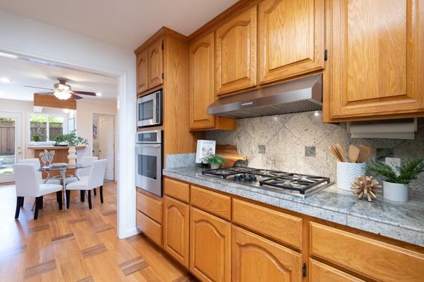 Dining room, Interior, Kitchen, Recessed Lighting, Stainless Steel Appliances, Wood Texture Flooring