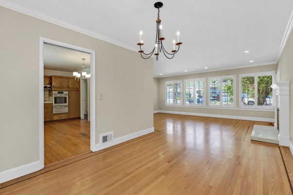 Chandelier, Empty room, Fireplace, Interior, Recessed Lighting, Wood Texture Flooring