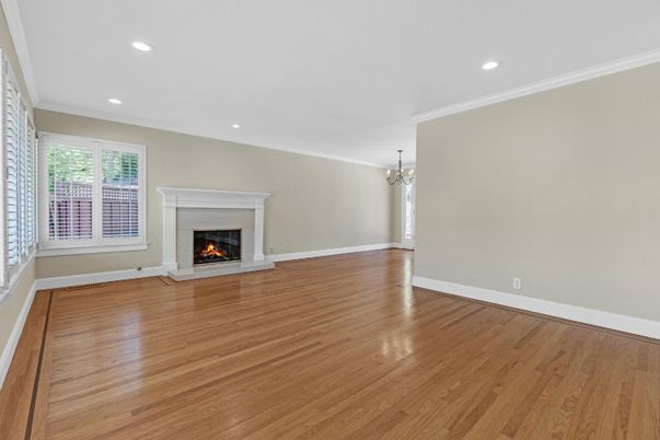 Chandelier, Empty room, Fireplace, Interior, Recessed Lighting, Wood Texture Flooring