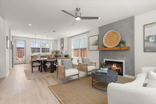 Dining room, Fireplace, Interior, Living room, Pendant Lights, Recessed Lighting, Wood Texture Flooring