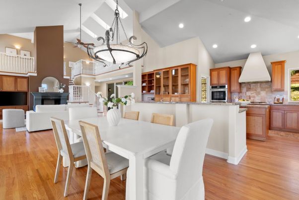 Dining room, Fireplace, Interior, Kitchen, Living room, Pendant Lights, Recessed Lighting, Stainless Steel Appliances, Wood Texture Flooring