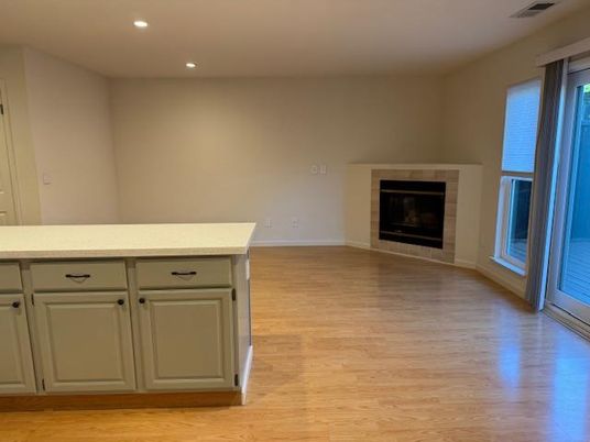 Empty room, Fireplace, Interior, Recessed Lighting, Wood Texture Flooring