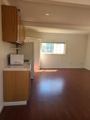 Interior, Kitchen, Tile Countertops, Wood Texture Flooring