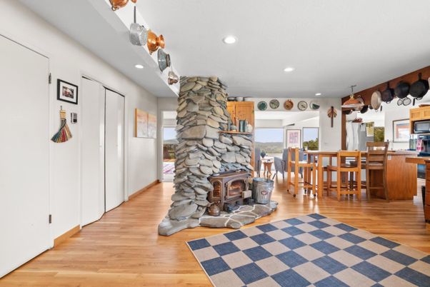 Dining room, Fireplace, Interior, Pendant Lights, Recessed Lighting, Wood Texture Flooring