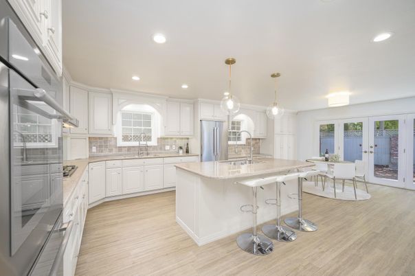 Dining room, Interior, Kitchen, Pendant Lights, Recessed Lighting, Stainless Steel Appliances, Wood Texture Flooring
