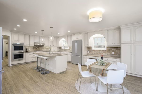 Dining room, Interior, Kitchen, Pendant Lights, Recessed Lighting, Stainless Steel Appliances, Wood Texture Flooring