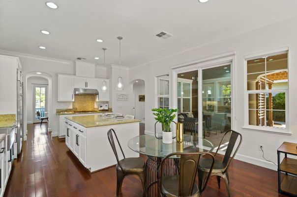 Dining room, Interior, Kitchen, Pendant Lights, Recessed Lighting, Stainless Steel Appliances, Wood Texture Flooring