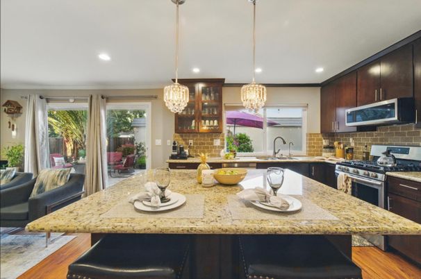 Chandelier, Interior, Kitchen, Pendant Lights, Recessed Lighting, Stainless Steel Appliances, Wood Texture Flooring