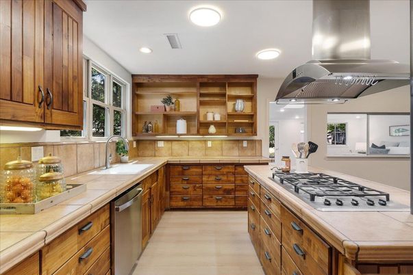 Interior, Kitchen, Recessed Lighting, Stainless Steel Appliances, Tile Countertops, Wood Texture Flooring
