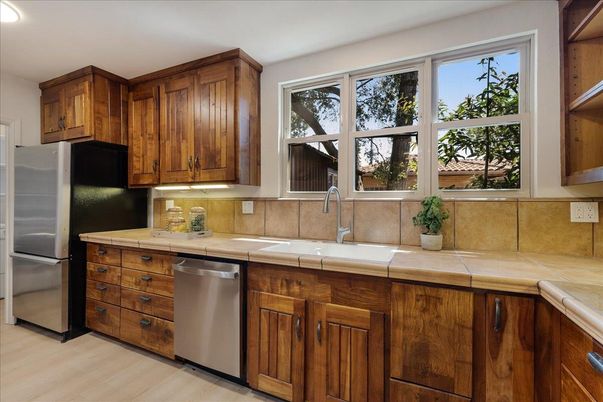 Interior, Kitchen, Recessed Lighting, Tile Countertops, Wood Texture Flooring