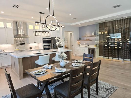 Dining room, Interior, Kitchen, Pendant Lights, Recessed Lighting, Stainless Steel Appliances, Wood Texture Flooring