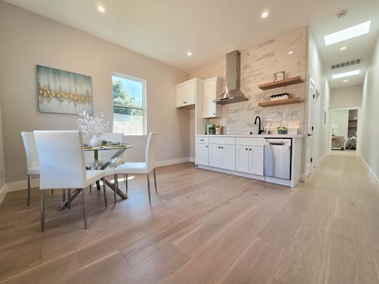 Dining room, Interior, Kitchen, Marble Walls, Recessed Lighting, Stainless Steel Appliances, Wood Texture Flooring