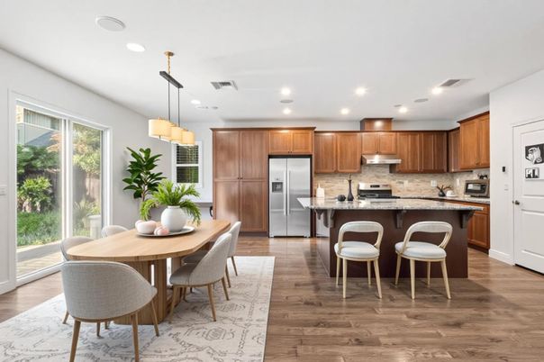 Dining room, Interior, Kitchen, Pendant Lights, Recessed Lighting, Stainless Steel Appliances, Wood Texture Flooring