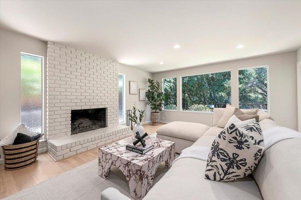 Fireplace, Interior, Living room, Recessed Lighting, Stone Walls, Wood Texture Flooring