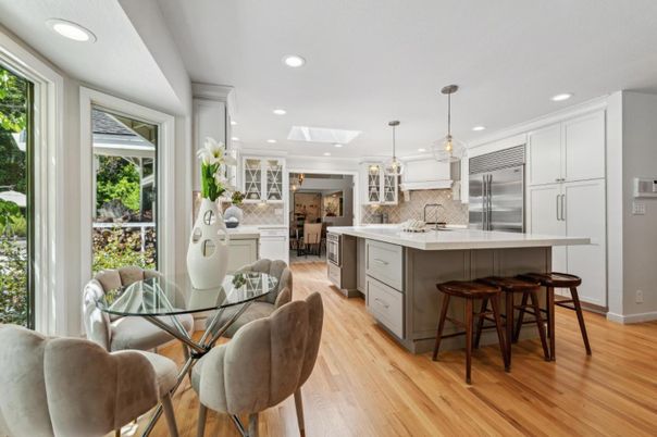 Dining room, Interior, Kitchen, Pendant Lights, Recessed Lighting, Stainless Steel Appliances, Wood Texture Flooring