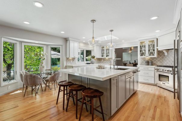 Dining room, Interior, Kitchen, Pendant Lights, Recessed Lighting, Stainless Steel Appliances, Wood Texture Flooring