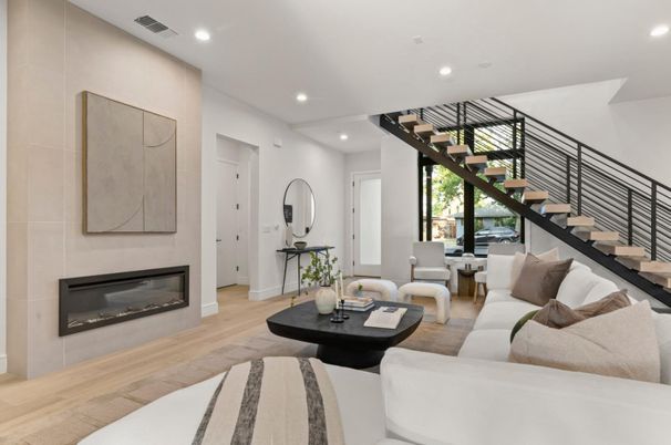 Dining room, Fireplace, Interior, Living room, Recessed Lighting, Wood Texture Flooring