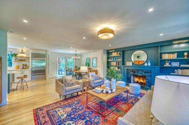 Chandelier, Dining room, Fireplace, Interior, Living room, Pendant Lights, Recessed Lighting, Wood Texture Flooring