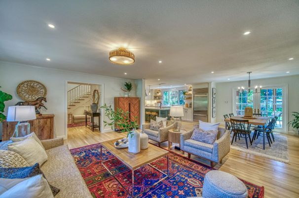 Chandelier, Dining room, Interior, Kitchen, Living room, Pendant Lights, Recessed Lighting, Stainless Steel Appliances, Wood Texture Flooring