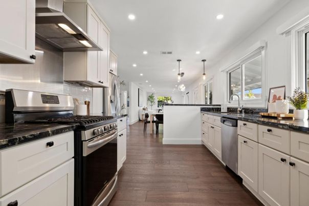 Dining room, Interior, Kitchen, Pendant Lights, Recessed Lighting, Stainless Steel Appliances, Wood Texture Flooring