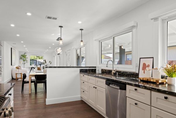 Dining room, Interior, Kitchen, Pendant Lights, Recessed Lighting, Stainless Steel Appliances, Wood Texture Flooring