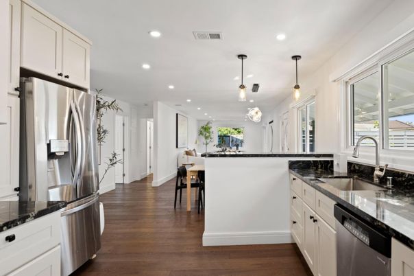 Dining room, Interior, Kitchen, Pendant Lights, Recessed Lighting, Stainless Steel Appliances, Wood Texture Flooring
