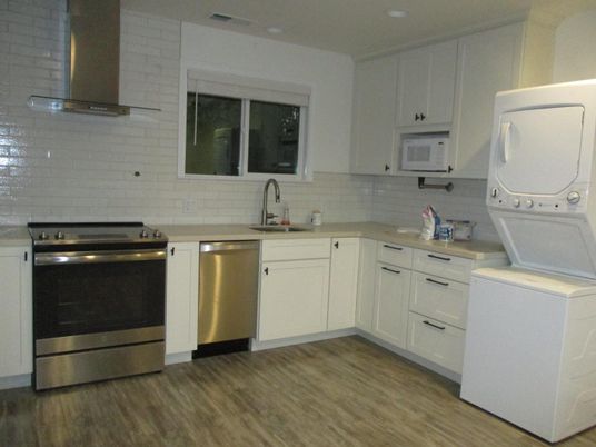 Interior, Kitchen, Recessed Lighting, Stainless Steel Appliances, Washer, Wood Texture Flooring
