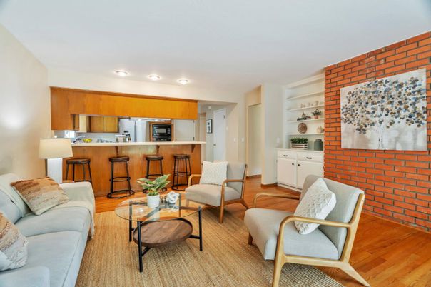 Interior, Kitchen, Living room, Recessed Lighting, Stainless Steel Appliances, Stone Walls, Wood Texture Flooring