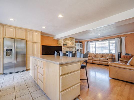 Interior, Kitchen, Living room, Recessed Lighting, Stainless Steel Appliances, Stone Walls, Wood Texture Flooring