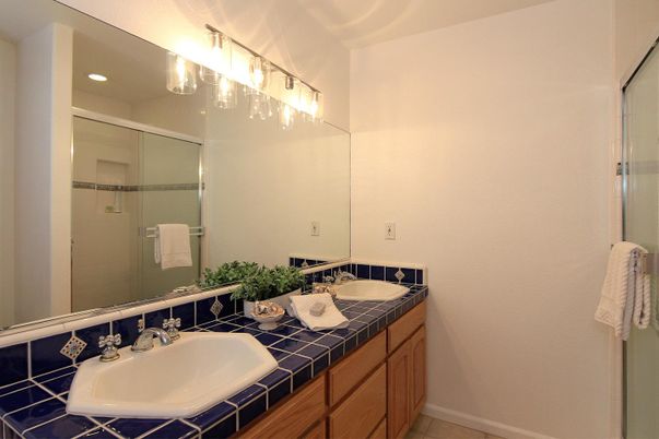Bathroom, Dual Sink Vanities, Glass Shower, Interior, Recessed Lighting, Tile Countertops