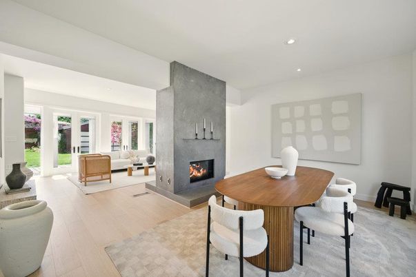 Dining room, Fireplace, Interior, Living room, Recessed Lighting, Wood Texture Flooring