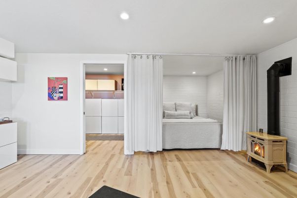 Bedroom, Fireplace, Interior, Recessed Lighting, Wood Texture Flooring