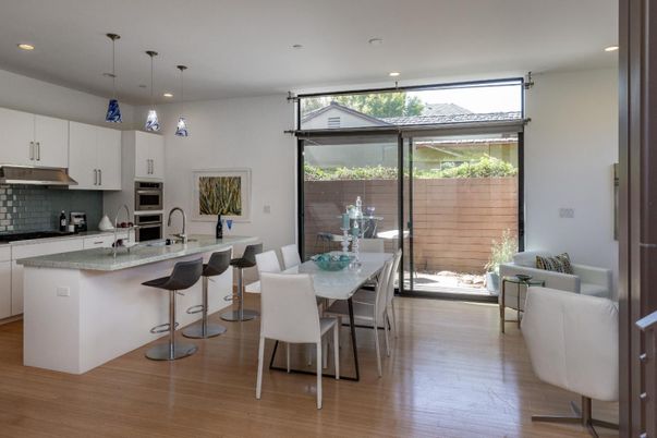 Dining room, Interior, Kitchen, Pendant Lights, Recessed Lighting, Stainless Steel Appliances, Wood Texture Flooring