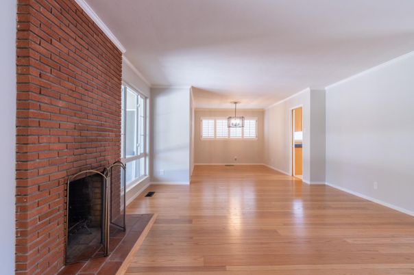 Empty room, Fireplace, Interior, Pendant Lights, Stone Walls, Wood Texture Flooring