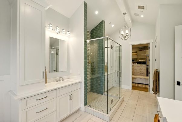Bathroom, Dual Sink Vanities, Glass Shower, Interior, Pendant Lights, Recessed Lighting, Walk-in Closets, Wood Texture Flooring