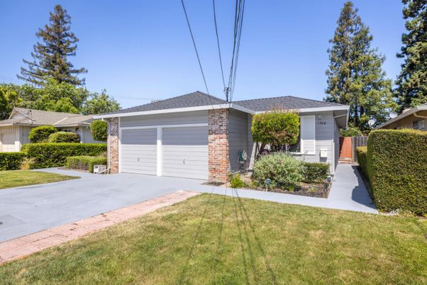 Attached, Backyard, Exterior, Facade, Brick Facade, Ranch