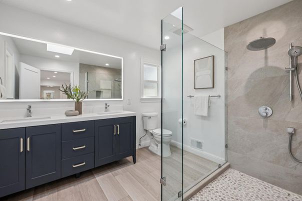 Bathroom, Dual Sink Vanities, Glass Shower, Interior, Recessed Lighting, Wood Texture Flooring