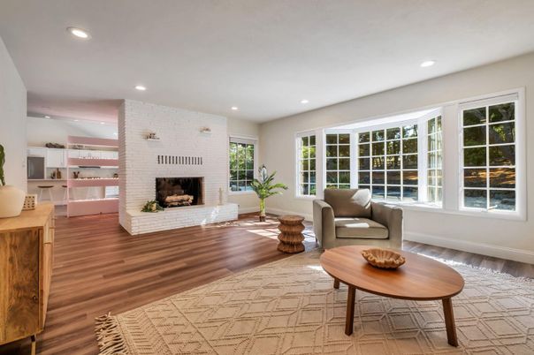 Fireplace, Interior, Living room, Recessed Lighting, Stone Walls, Wood Texture Flooring